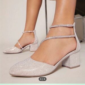 Brand New. Glitter Chunky Heeled Ankle Strap Pumps
Champagne